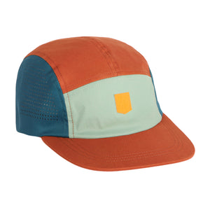 The Alpha 360 Tech Cap Terracotta features rust orange, teal, and light green panels, a yellow rectangular front patch, and perforated holes on the teal side panel.