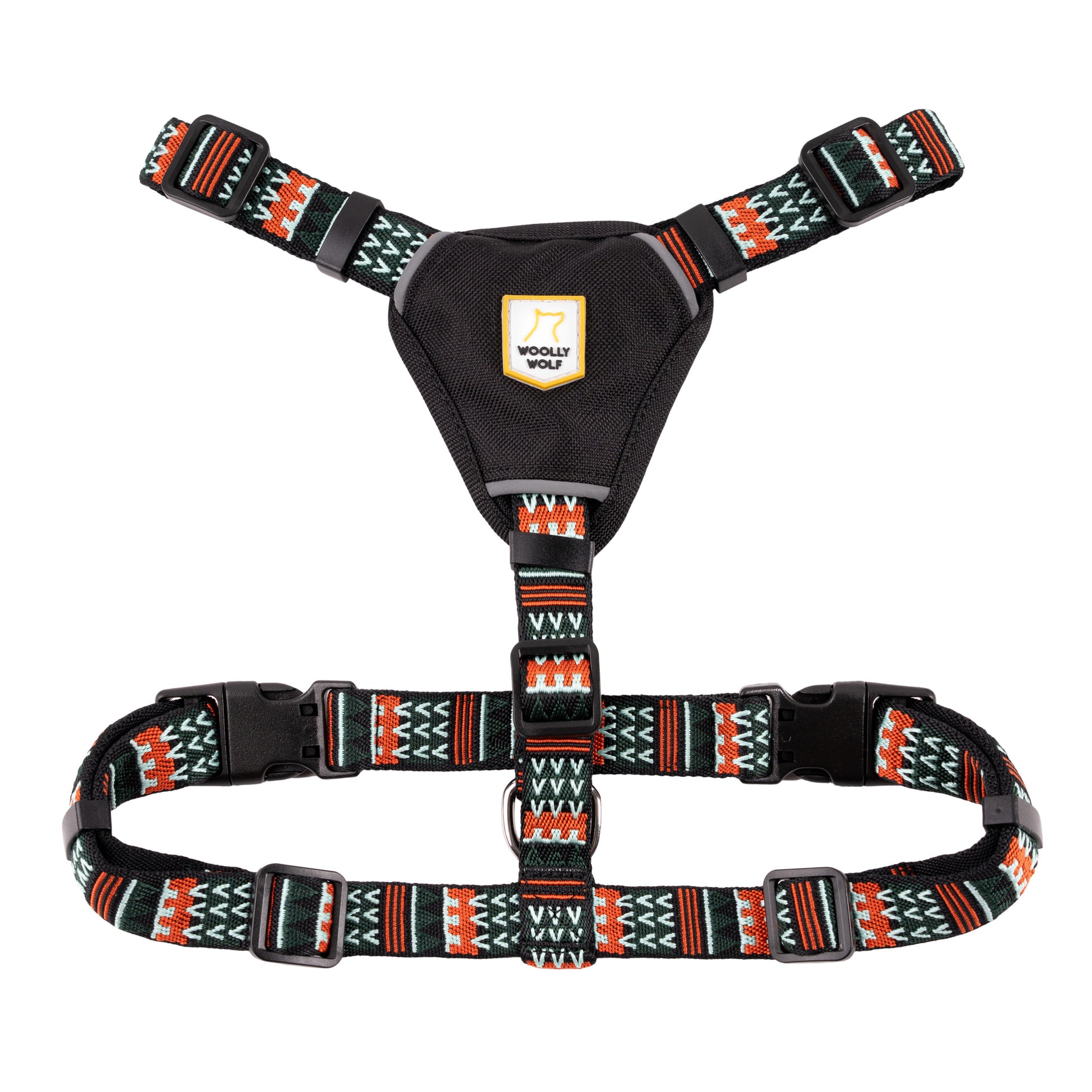 Colorful patterned dog harness with adjustable straps and a black triangular chest pad featuring a Woolly Wolf logo.