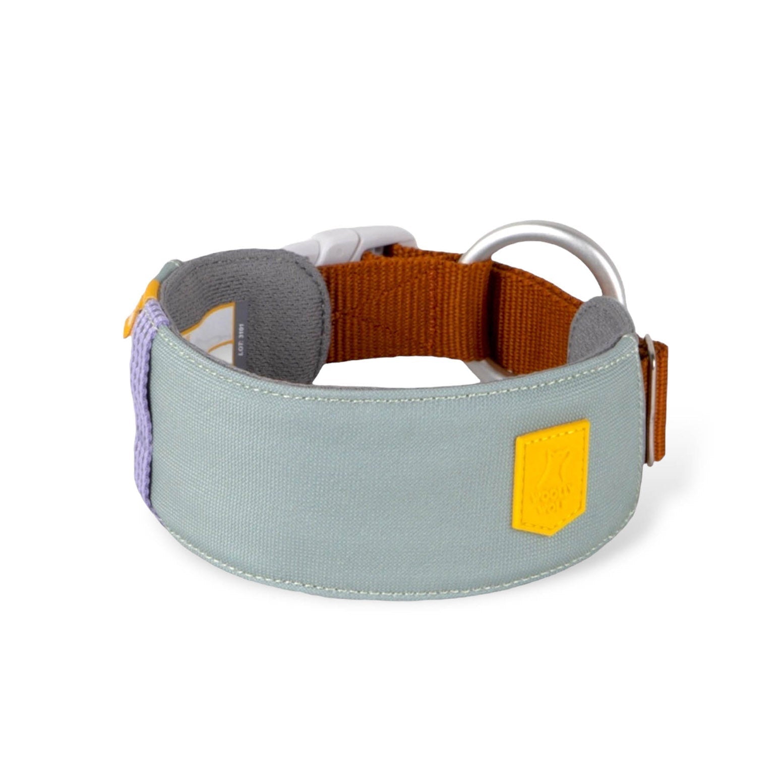 The Alpha 360 Dog Collar Glacier Green features glacier green fabric with a yellow patch, brown adjustable strap, silver D-ring, and a white buckle closure.