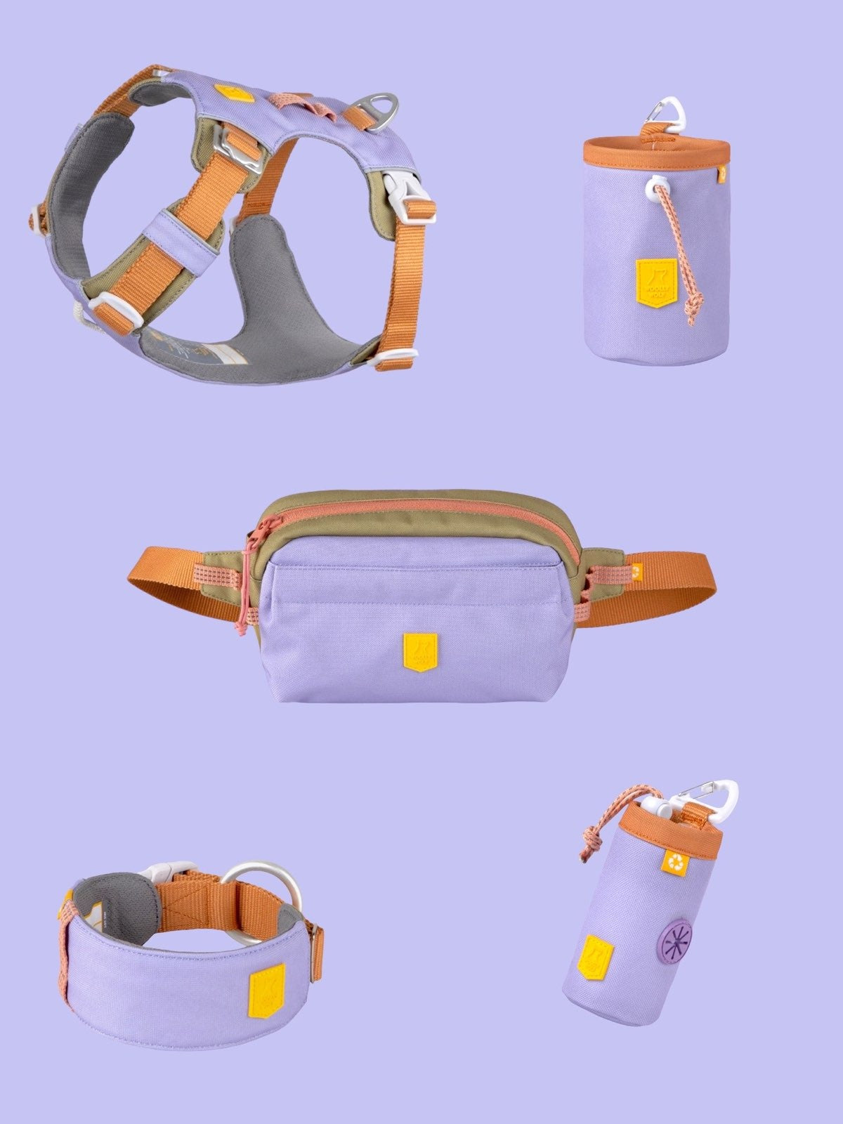 A set of pastel purple and tan pet accessories, including a harness, treat pouch, collar, waste bag holder, and water bottle, all arranged on a light purple background.