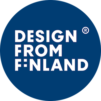 White Design from Finland text with a registered trademark on a blue circular background.