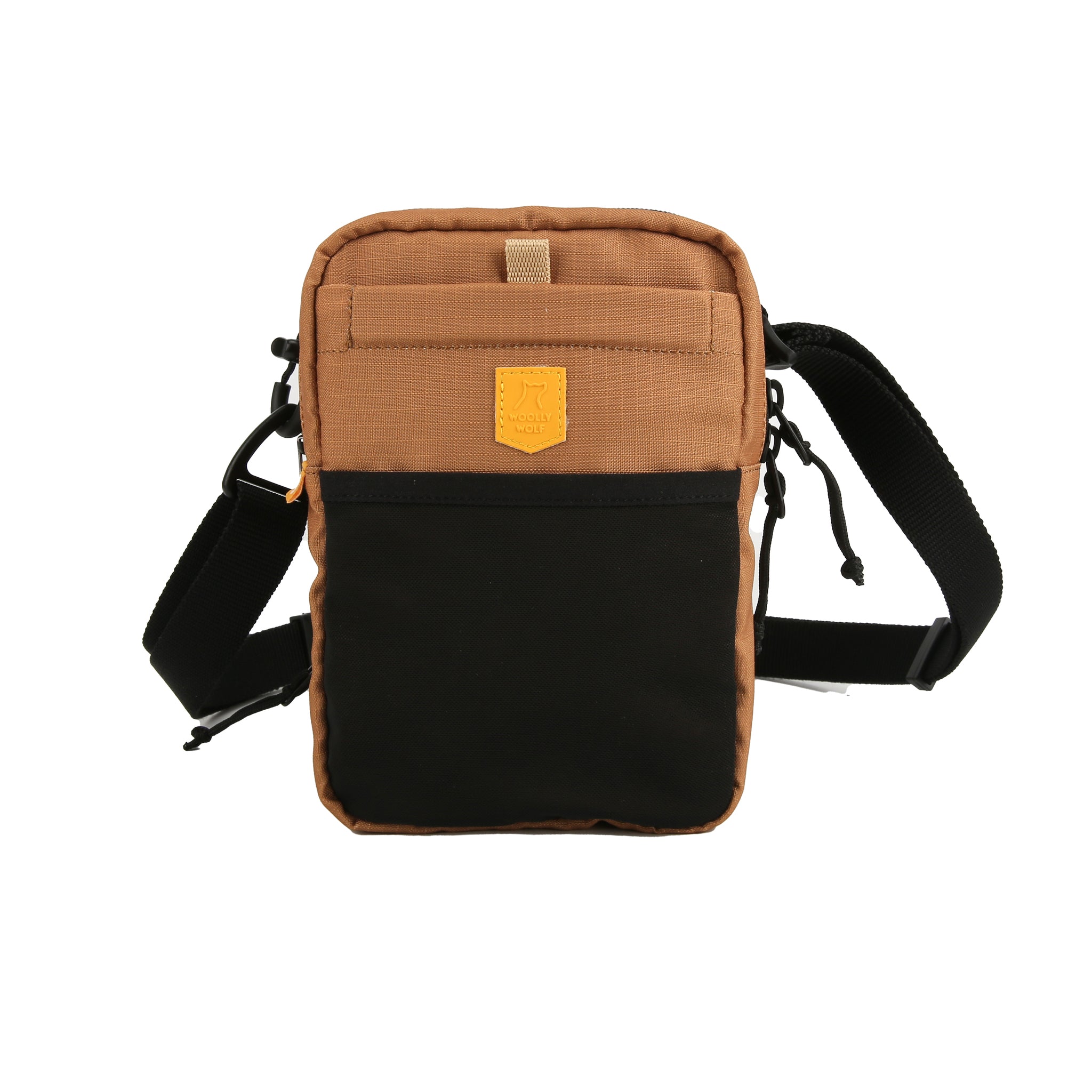 Small brown and black crossbody bag with a front pocket and adjustable black strap.